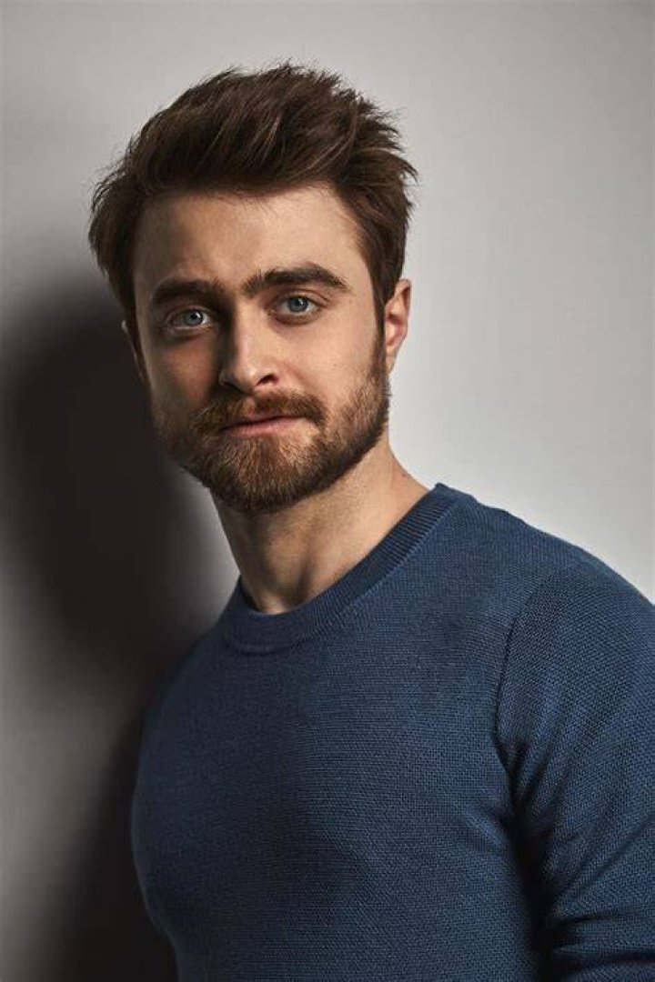 Daniel Radcliffe (L) and David Holmes (R) chat in a still from HBO's 'David Holmes: The Boy Who Lived' documentary.