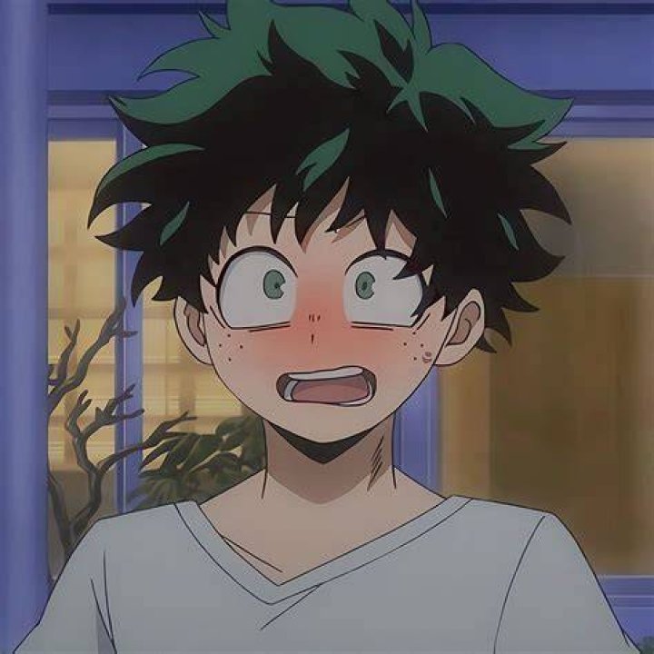 Izuku Modiriya smiling and blushing in season 1, episode 1 of 'My Hero Academia'.