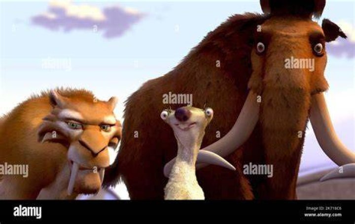 Manny, Diego, and Sid are standing on the ice.