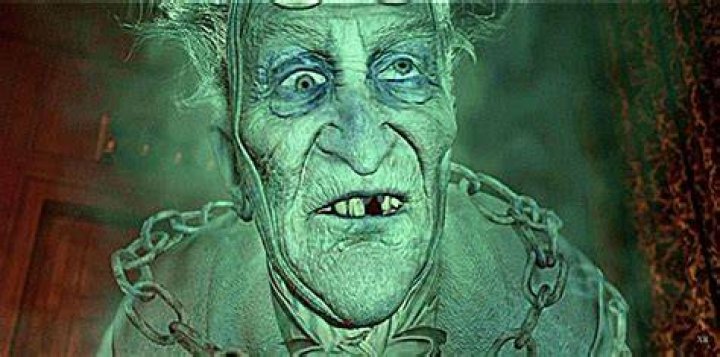 Why is Jacob Marley's jaw broken?